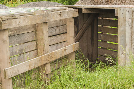 Wooden crates standing on grassの写真素材