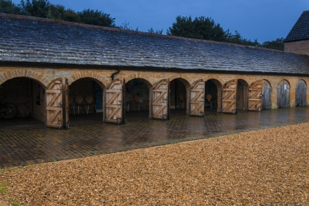 Stone archways with open wooden doorsの写真素材