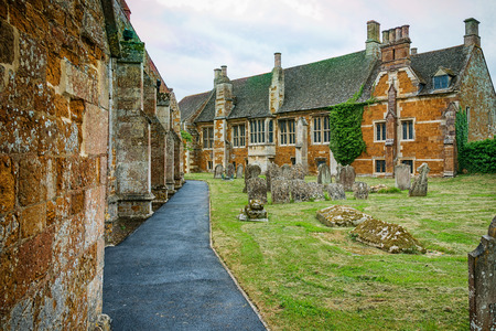 Path by side of Church past a Graveyardの写真素材