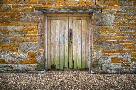 Old rotting weathered doorsの写真素材