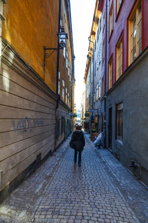 A person walking in an alley at Stockholm Old Town, Swedenのeditorial素材