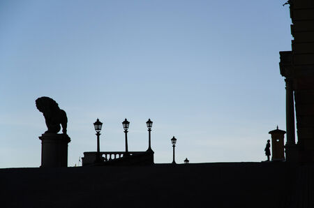 Stockholm, Sweden, March 13, 2014 - Lion statue and guard at the Royal palace in Stockholm the capital of Swedenのeditorial素材