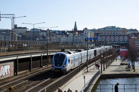Stockholm, Sweden, March 13, 2014 - Train arriving at Stockholm City in Swedenのeditorial素材