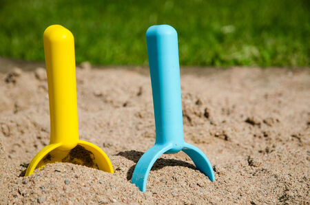 Closeup of colorful sandbox tools - conceptual sandbox level imageの写真素材
