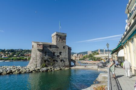 Rapallo, Italy - October 2, 2018: The old castle and the boardwalk in Rapallo by the mediterranean sea in the province Liguria in Italyのeditorial素材