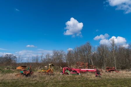 Abandoned farming equipment in a field