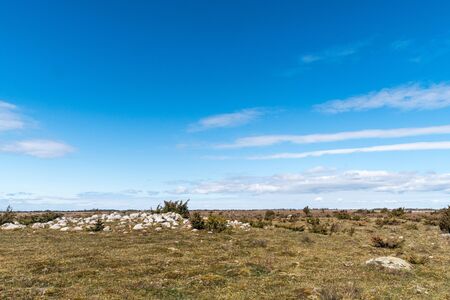 Remote ancient remains  in the great plain grassland Stora Alvaret on the swedish island Oland