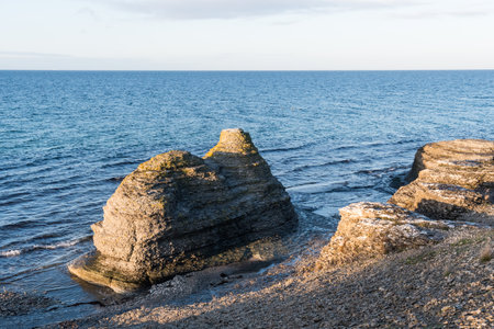 Eroded linestone cliffs by the coast of the island Oland in the Baltic Seaの写真素材