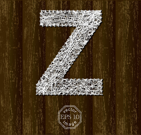 Letter Z, made with threads on pins on wooden background. Part of collection.のイラスト素材