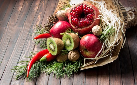 Fruit bouquet with kiwis and chilies.