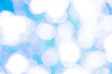 Blue and white bokeh background from naturalの写真素材