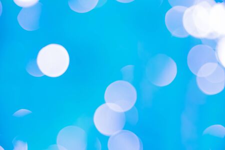 Blue and white bokeh background from naturalの写真素材