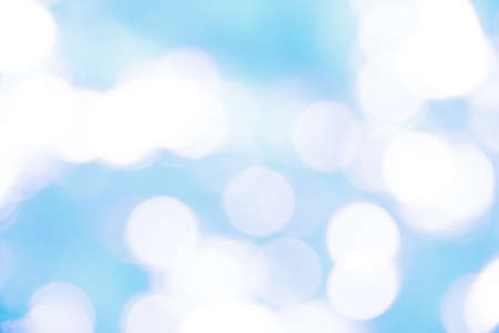 Blue and white bokeh background from naturalの写真素材
