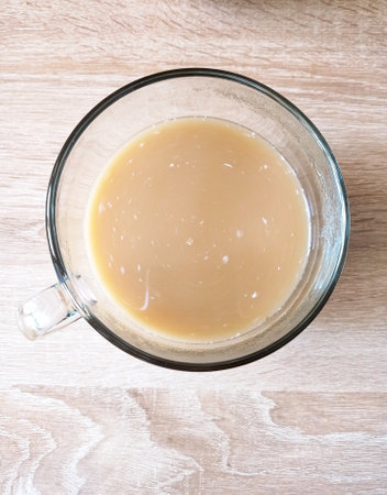 Cup of coffee with milk, top view. Glass mugの写真素材