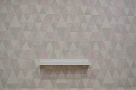 White shelf for paintings and decor on the wallの写真素材