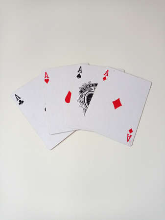 Playing cards on a white background. The concept of gambling and poker.