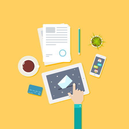 On the desktop a tablet with email symbol on the screen, document, smartphone, pencil, coffee cup and cactus in a pot. Vector illustration business concept design.のイラスト素材