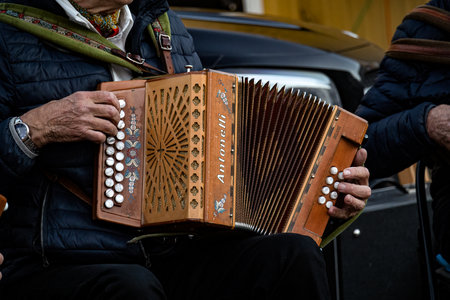 In groups, people meet and play accordions and other instrumentsの写真素材