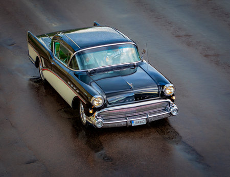 Old american classic car on the road