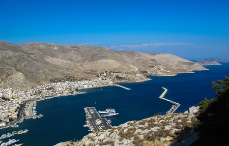 Beautiful view from the top of the hill on the marvelous bay Greek island of Kalymnos. The port of...