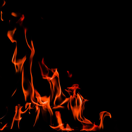 Flames of fire on a black background. Space for copy, text, your words. With a 1x1 square...