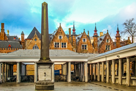 Old Fish Market called Vismarkt and medieval historical buildings of Bruges Belgiumの写真素材