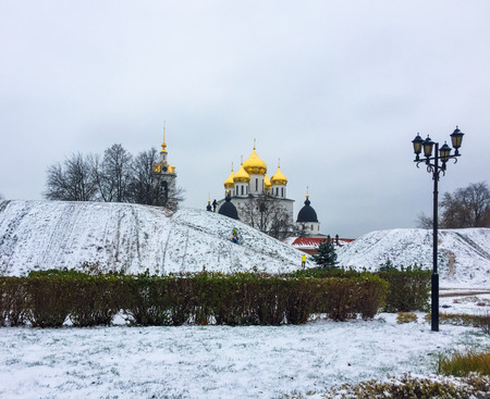 City ââshafts covered with snow and Assumption Cathedral in the Kremlin in Dmitrov, Moscow Region, Russiaの写真素材