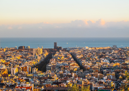 Aerial view of Barcelona city and mediterranean sea from Park Guell in sunset. Spain. November 2010の写真素材