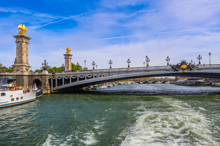 Historic bridge (Pont Alexandre III) over the River Seine in Paris Franceの写真素材
