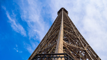 Eiffel Tower in Paris France against blue sky with clouds. April 2019の写真素材