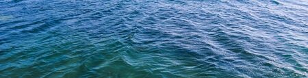 Beautiful background of blue sea. Rest and relaxation on the sea coastの写真素材