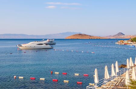 Beautiful Mediterranean coast with islands, mountains and yachts in the blue seaの写真素材