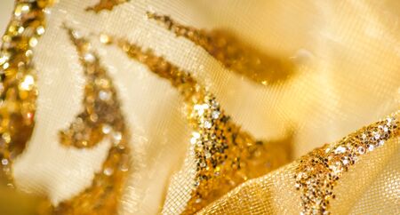 Golden abstract blur defocused background.の写真素材