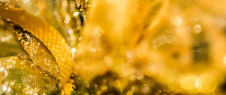 Golden abstract blur defocused background.の写真素材