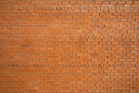 A close up of a red brick wall. High quality photo.の写真素材