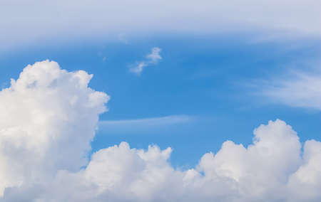 Background of blue sky with white clouds.の写真素材