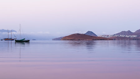Beautiful sunrise on the Aegean Sea with islands, mountains and boats. High quality photoの写真素材