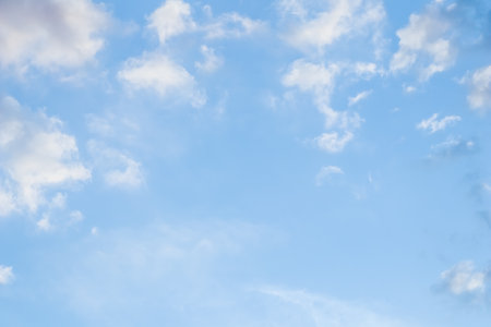 Background of blue sky with white clouds. natural backdropの写真素材