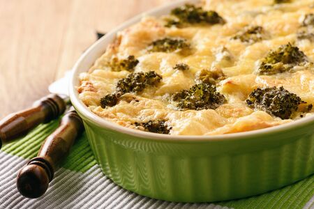 Casserole with potatoes, minced meat, broccoli and cheese.の写真素材