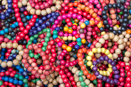 The variety of wooden colorful beads.の写真素材