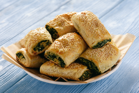 Puff pastry rolls with spinach and ricotta.の写真素材