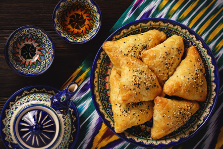 Puff pastries with meat (samosa) - traditional uzbek and indian pasrty.の写真素材