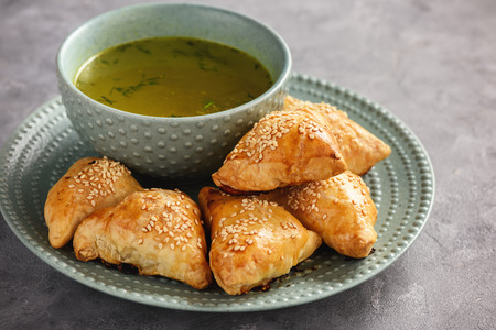Puff pastries with chicken meat, samosa, oriental uzbek cuisine.