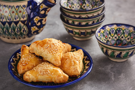 Puff pastries with chicken meat, samosa, oriental uzbek cuisine.の写真素材
