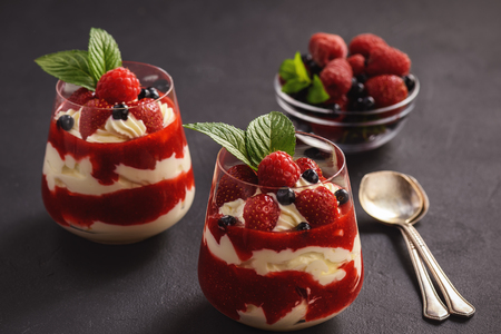 Strawberry mascarpone mousse dessert, on blackの写真素材