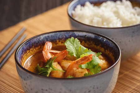 Tom yum soup with shrimp and jasmine riceの写真素材