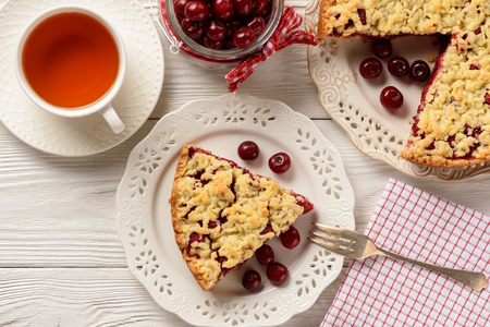 Homemade cherry pie, on wooden table.の写真素材