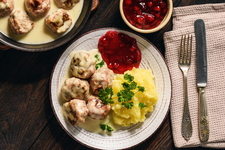 Swedish meatballs with creamy gravy, mashed potatoes and lingonberry sauce.の写真素材