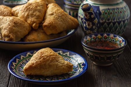 Puff pastries with meat (samosa) - traditional uzbek and indian pasrty.の写真素材