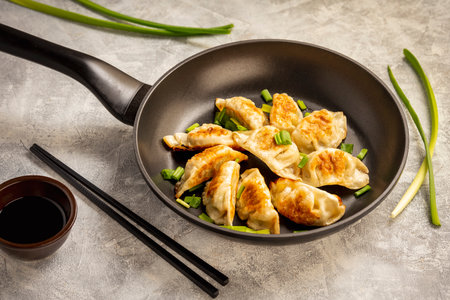 Gyoza, Japanese pan-fried dumplings, on light background.の写真素材
